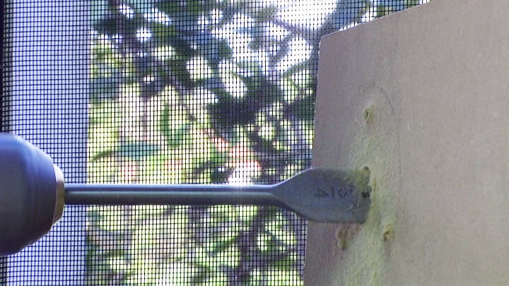 Drilling a hole for security camera installation Drilling a hole for security camera installation
