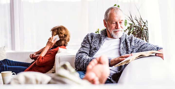 senior couple relaxing at home senior couple relaxing at home